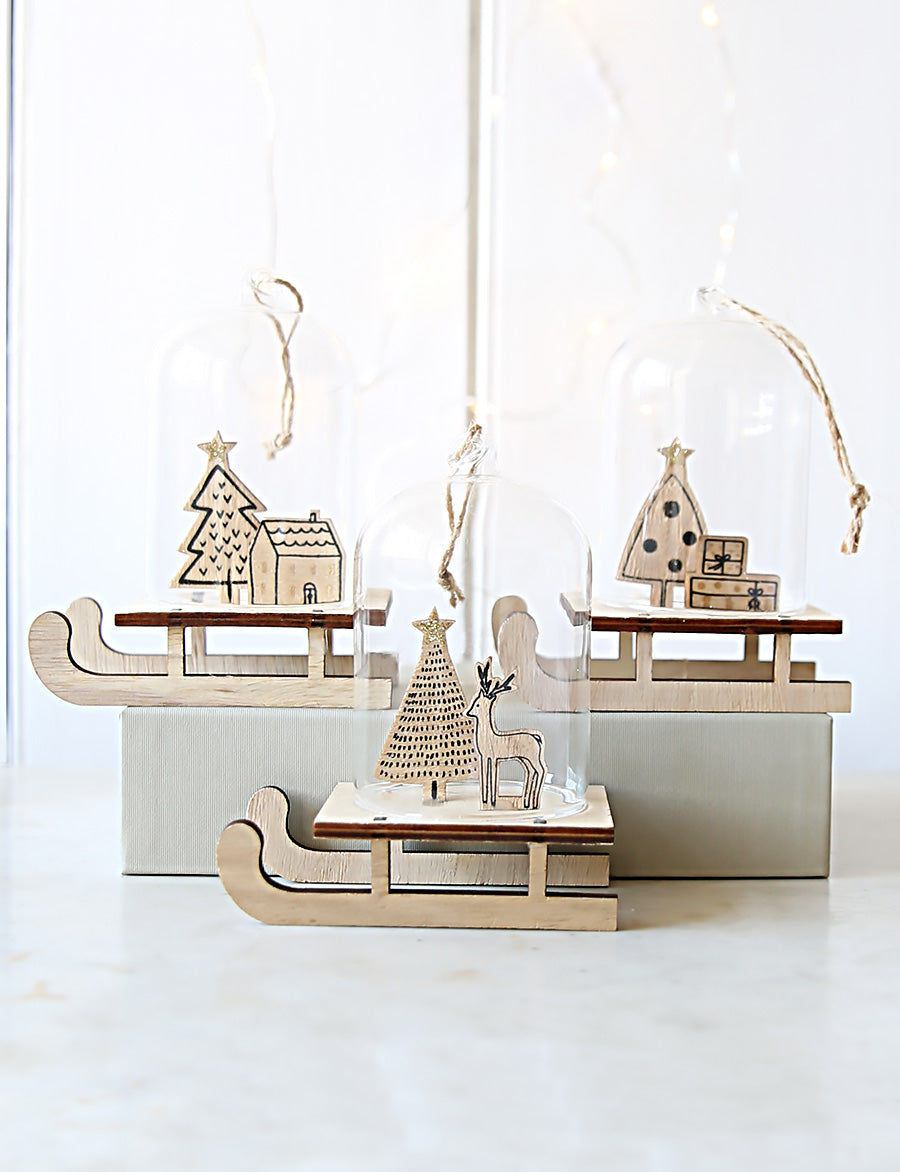 Weihnachtsszenen auf Schlitten